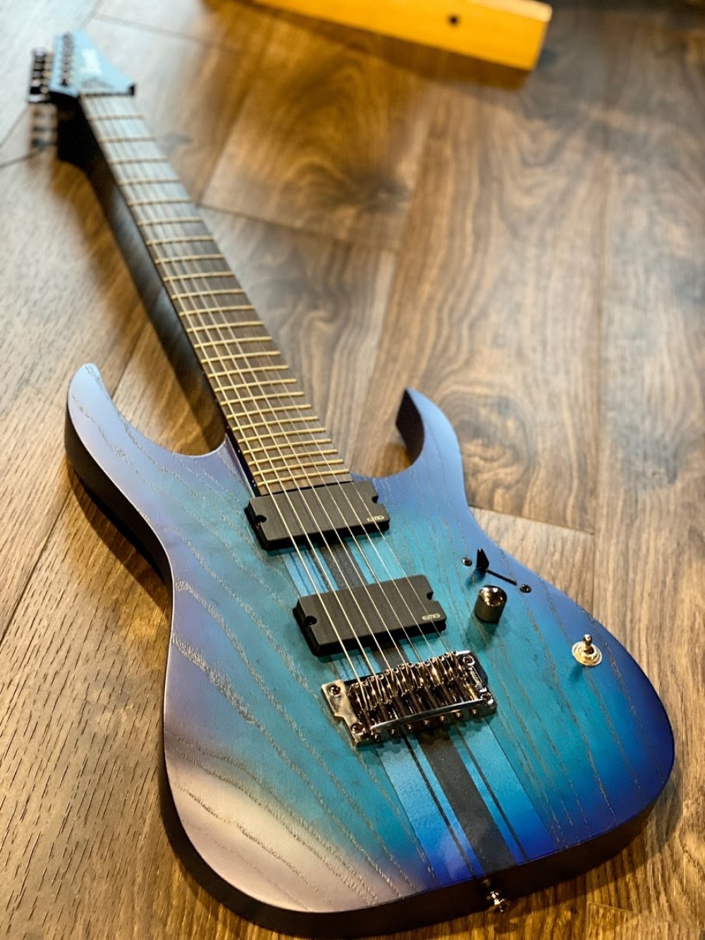 Ibanez RGIT27FE-SBF Iron Label 7-String in Sapphire Blue Flat